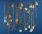 Preview: Gold colored tinsel garlands with spun cotton bells,  ca. 560 cm