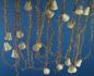 Preview: Gold colored tinsel garlands with spun cotton bells,  ca. 560 cm