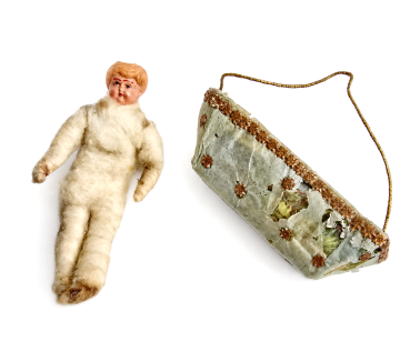 Preview: Wattefigur mit Celluloid Kopf im Körbchen um 1900