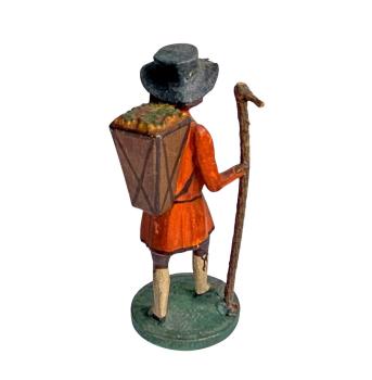 Antique grulich crib figurine, Gift bringer with pannier, around 1900 (10 cm)