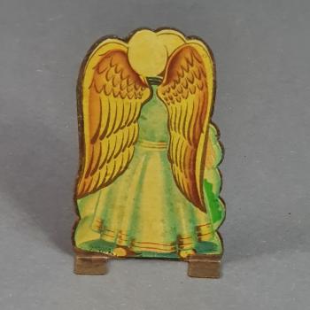 Angel with christmas tree, lithographed tin, ca. 1920