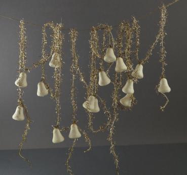 Gold colored tinsel garlands with spun cotton bells,  ca. 400 cm