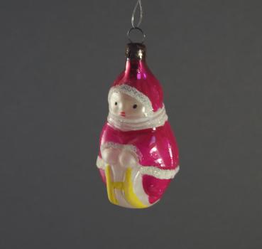 Eskimo Mädchen auf Schlitten, ~ 1950