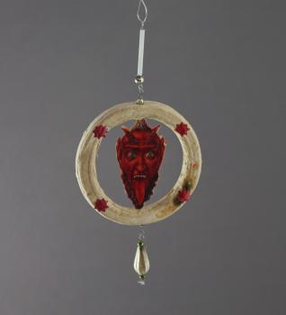 Spun cotton ornament with devil scraps,  ca. 1920