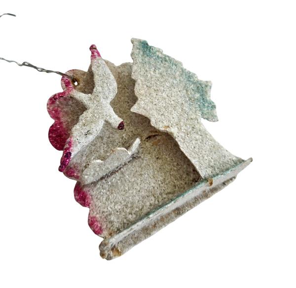 Cardboard ornament with a bird around 1930