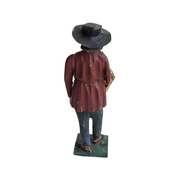 Antique grulich crib figurine, Gift bringer with basket, around 1900 (10 cm)