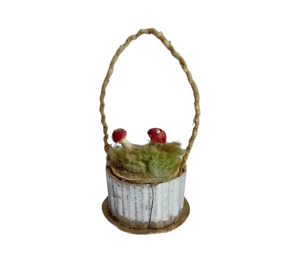 Basket with mushrooms around 1920