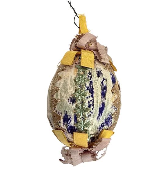 Decorated chicken egg as a Christmas tree ornament, around 1900