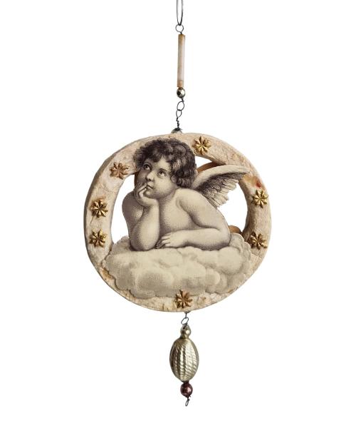 Spun cotton ornament with angel scraps,  ca. 1920