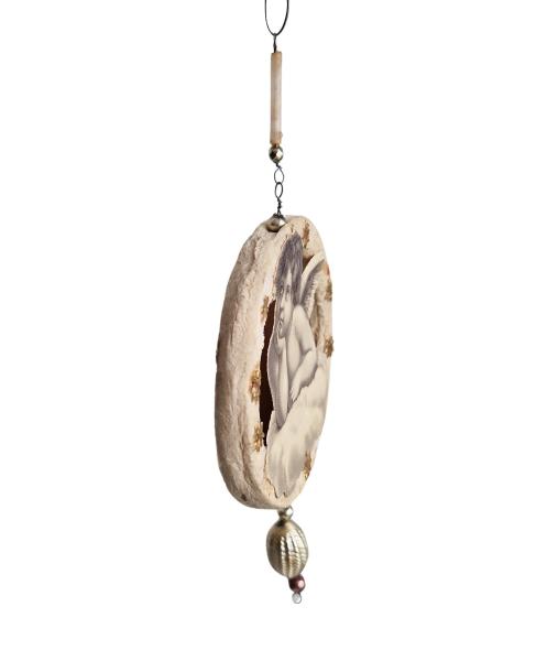 Spun cotton ornament with angel scraps,  ca. 1920