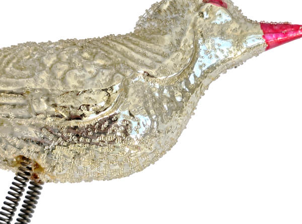 Song bird with venetian dew on clip, around 1920