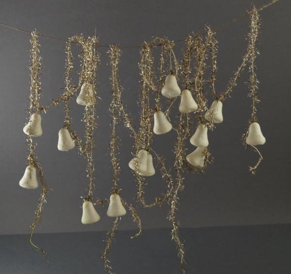Gold colored tinsel garlands with spun cotton bells,  ca. 400 cm