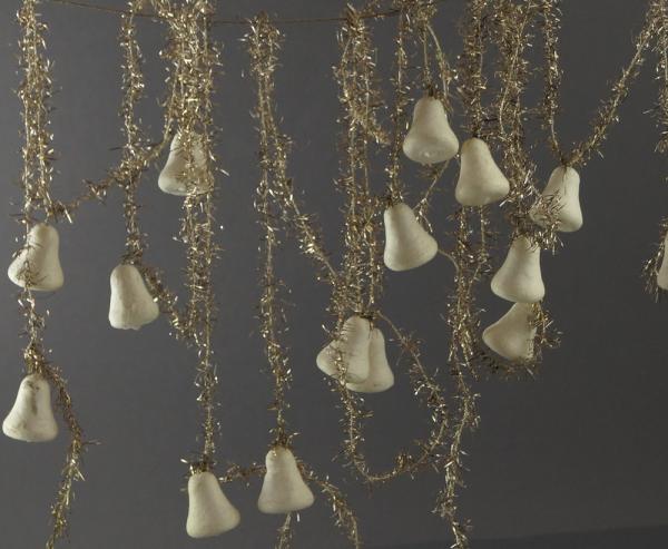 Gold colored tinsel garlands with spun cotton bells,  ca. 400 cm