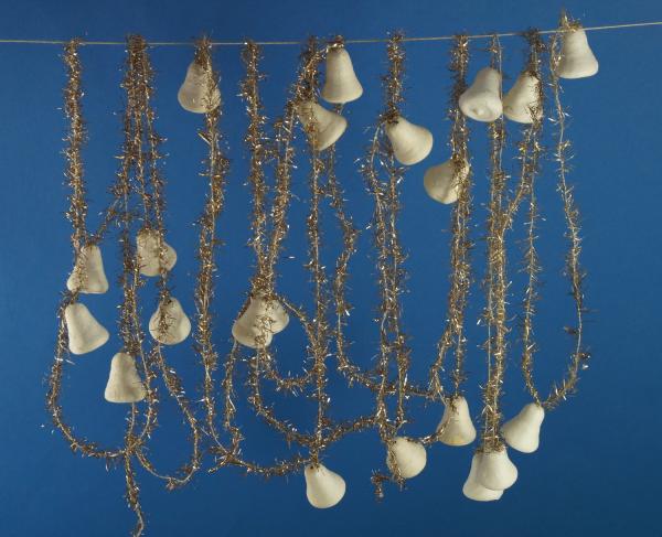 Gold colored tinsel garlands with spun cotton bells,  ca. 560 cm