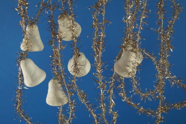 Gold colored tinsel garlands with spun cotton bells,  ca. 560 cm