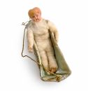 Wattefigur mit Celluloid Kopf im Körbchen um 1900